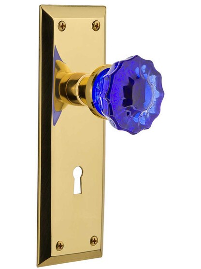 New York Door Set with Keyhole and Colored Fluted Crystal Glass Knobs Cobalt Blue in Polished Brass.